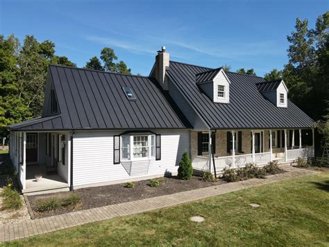 black metal roofs on houses|black standing seam metal roofing.